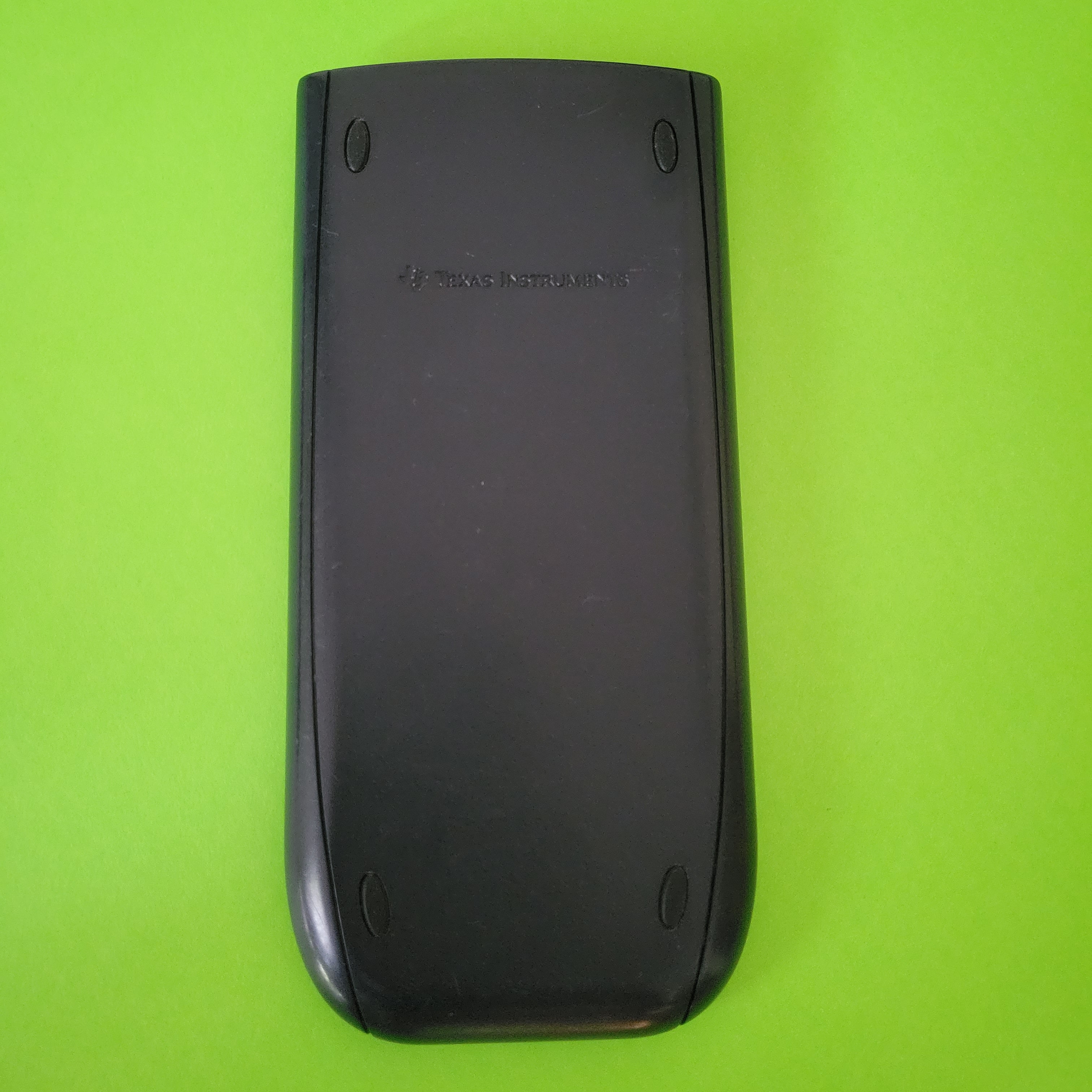 An image of the case of a Texas Instruments TI-84 plus graphing calculator